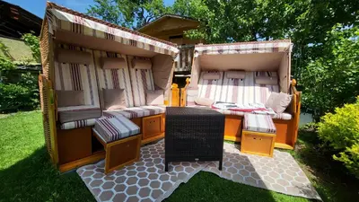 Ein Garten an der Unterkunft Ferienhaus AB