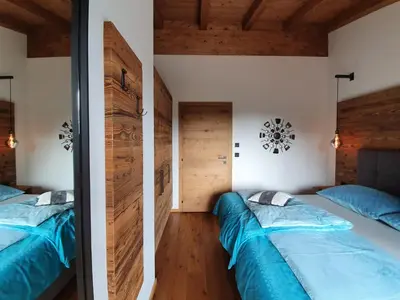 Ein Bett oder Betten in einem Zimmer der Unterkunft Zeitfrei Chalet Apartments