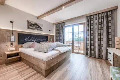 Ein Bett oder Betten in einem Zimmer der Unterkunft Gasthaus Goglhof