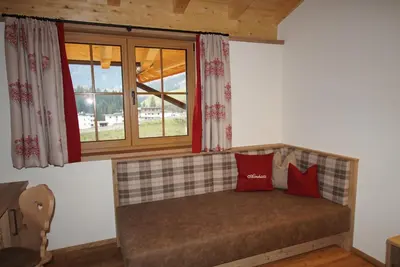 Ein Sitzbereich in der Unterkunft Gasthaus Goglhof