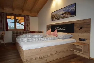 Ein Bett oder Betten in einem Zimmer der Unterkunft Gasthaus Goglhof