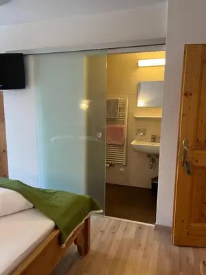 Ein Bett oder Betten in einem Zimmer der Unterkunft Badererhof Christine Wechselberger