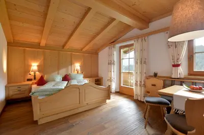 Ein Bett oder Betten in einem Zimmer der Unterkunft Koasa Chalet