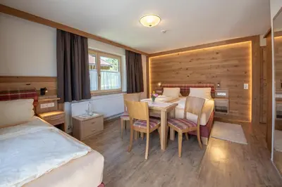 Ein Bett oder Betten in einem Zimmer der Unterkunft Hölzl Bed & Breakfast