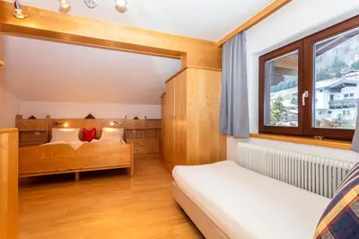 Ein Bett oder Betten in einem Zimmer der Unterkunft Hölzl Bed & Breakfast