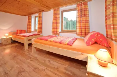 Ein Bett oder Betten in einem Zimmer der Unterkunft Bauernhof Mühltalhof