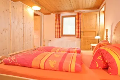 Ein Bett oder Betten in einem Zimmer der Unterkunft Bauernhof Mühltalhof