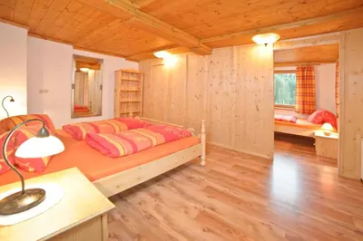 Ein Bett oder Betten in einem Zimmer der Unterkunft Bauernhof Mühltalhof