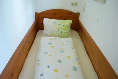 Ein Bett oder Betten in einem Zimmer der Unterkunft Ferienwohnung Gassoid