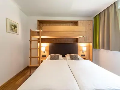 Ein Bett oder Betten in einem Zimmer der Unterkunft Chalet in Saalbach near Ski Slopes