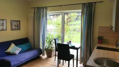 Ein Sitzbereich in der Unterkunft Landhaus Almdorf