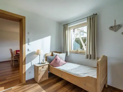 Ein Bett oder Betten in einem Zimmer der Unterkunft Appartement Holaus