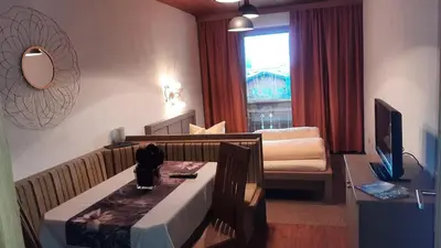 Ein Bett oder Betten in einem Zimmer der Unterkunft Ferienhof Kampfl