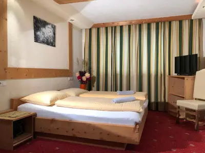 Ein Bett oder Betten in einem Zimmer der Unterkunft Ferienhof Kampfl
