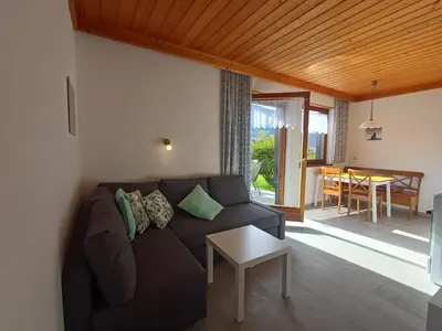 Ein Sitzbereich in der Unterkunft Profelt`s Apartments Uttendorf - Steinbock Lodges