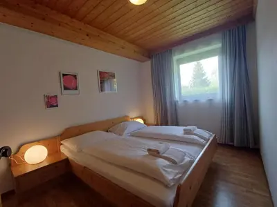Ein Bett oder Betten in einem Zimmer der Unterkunft Profelt`s Apartments Uttendorf - Steinbock Lodges