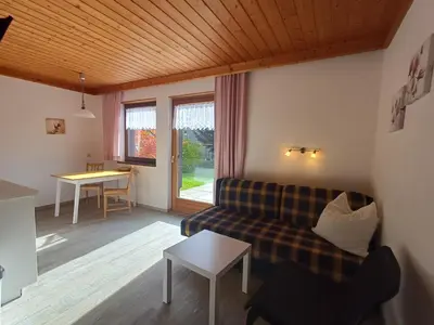 Ein Sitzbereich in der Unterkunft Profelt`s Apartments Uttendorf - Steinbock Lodges