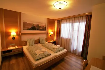 Ein Bett oder Betten in einem Zimmer der Unterkunft All Inclusive Hotel Bachmayerhof