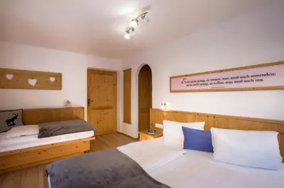 Ein Bett oder Betten in einem Zimmer der Unterkunft Ferienhof Stadlpoint