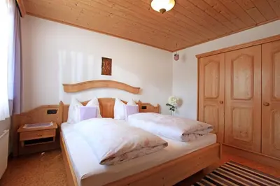 Ein Bett oder Betten in einem Zimmer der Unterkunft Ferienwohnung Gimplinger
