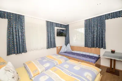 Ein Bett oder Betten in einem Zimmer der Unterkunft MH Appartement Hochwimmer