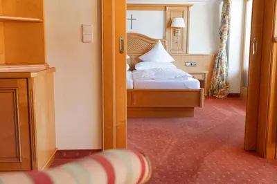 Ein Bett oder Betten in einem Zimmer der Unterkunft Unser Berghof