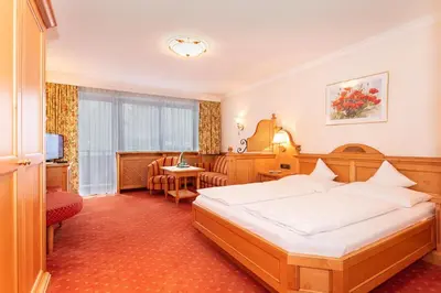 Ein Bett oder Betten in einem Zimmer der Unterkunft Unser Berghof