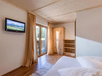 Ein Bett oder Betten in einem Zimmer der Unterkunft Appartement Hinterholzer