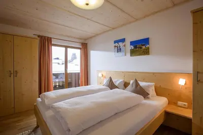 Ein Bett oder Betten in einem Zimmer der Unterkunft Appartement Hinterholzer