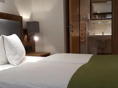 Ein Bett oder Betten in einem Zimmer der Unterkunft Denggnhof