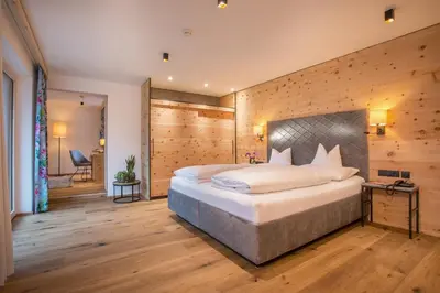 Ein Bett oder Betten in einem Zimmer der Unterkunft Hotel Tipotsch
