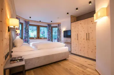 Ein Bett oder Betten in einem Zimmer der Unterkunft Hotel Tipotsch