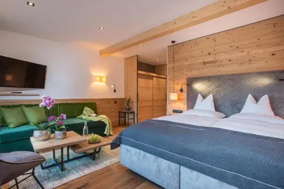 Ein Bett oder Betten in einem Zimmer der Unterkunft Hotel Tipotsch