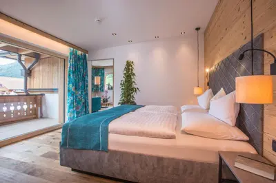 Ein Bett oder Betten in einem Zimmer der Unterkunft Hotel Tipotsch