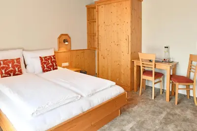 Ein Bett oder Betten in einem Zimmer der Unterkunft Pension Eichenheim