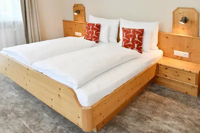 Ein Bett oder Betten in einem Zimmer der Unterkunft Pension Eichenheim