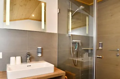 Ein Badezimmer in der Unterkunft Pension Eichenheim