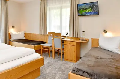 Ein Bett oder Betten in einem Zimmer der Unterkunft Pension Eichenheim