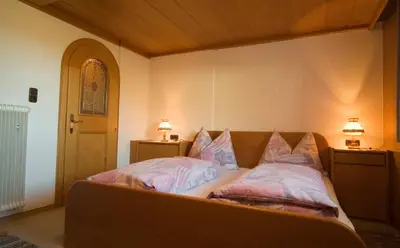 Ein Bett oder Betten in einem Zimmer der Unterkunft Gästehaus Rosi