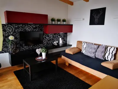 Ein Sitzbereich in der Unterkunft Appartement Hofer