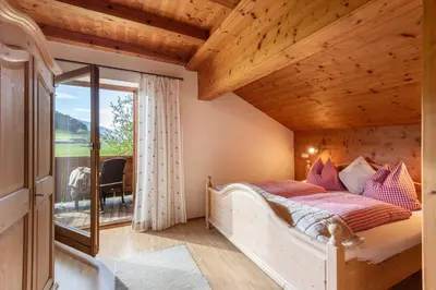 Ein Bett oder Betten in einem Zimmer der Unterkunft Bauernhof Hintenberg