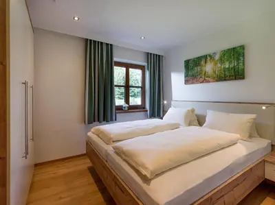 Ein Bett oder Betten in einem Zimmer der Unterkunft Haus Elsa