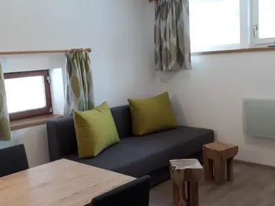 Ein Sitzbereich in der Unterkunft Appartement Wildkogelblick