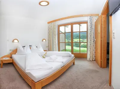 Ein Bett oder Betten in einem Zimmer der Unterkunft Apartments Fiechtl