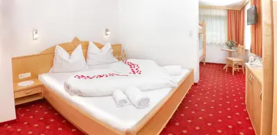 Ein Bett oder Betten in einem Zimmer der Unterkunft Apartments Fiechtl