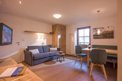 Ein Sitzbereich in der Unterkunft Appartements Oswald