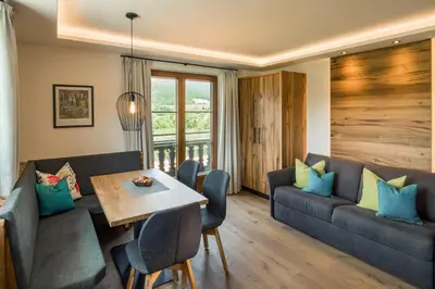 Ein Sitzbereich in der Unterkunft Appartements Oswald