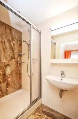 Ein Badezimmer in der Unterkunft Ferienhof Wölflbauer