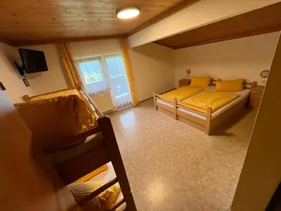 Ein Bett oder Betten in einem Zimmer der Unterkunft Ferienhof Wölflbauer