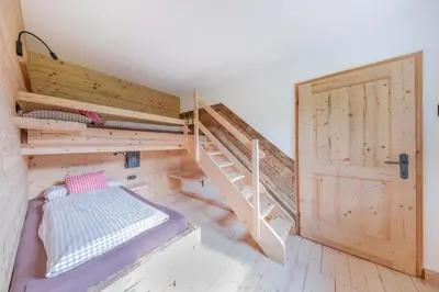 Ein Bett oder Betten in einem Zimmer der Unterkunft Getznerhof